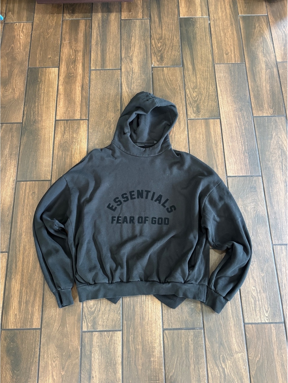 Fear of god essentials hoodie jet black